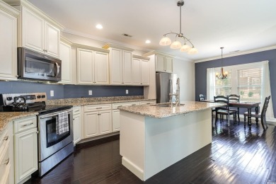 Step into luxury and comfort with this stunning executive-style on Wild Wing Plantation in South Carolina - for sale on GolfHomes.com, golf home, golf lot