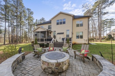 Welcome to your Dream Home perfectly tucked away behind the 8th on Hasentree Club in North Carolina - for sale on GolfHomes.com, golf home, golf lot