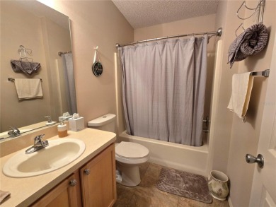 Fantastic location for this Villa in The Villages -- just on The Links of Spruce Creek in Florida - for sale on GolfHomes.com, golf home, golf lot