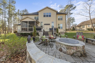 Welcome to your Dream Home perfectly tucked away behind the 8th on Hasentree Club in North Carolina - for sale on GolfHomes.com, golf home, golf lot