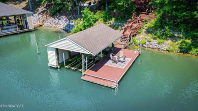 This lovely lakefront home located in a quiet cove, is nestled on Toqua Golf Course - Loudon County in Tennessee - for sale on GolfHomes.com, golf home, golf lot