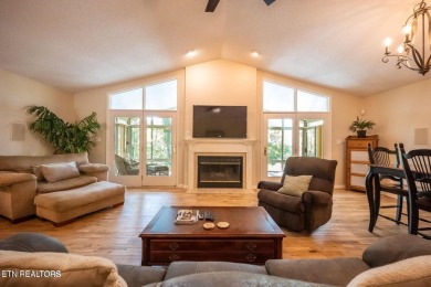 This lovely lakefront home located in a quiet cove, is nestled on Toqua Golf Course - Loudon County in Tennessee - for sale on GolfHomes.com, golf home, golf lot