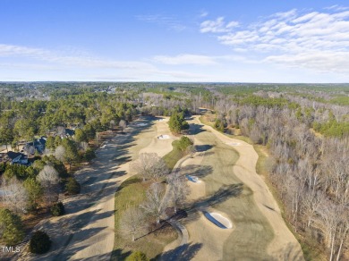 Welcome to your Dream Home perfectly tucked away behind the 8th on Hasentree Club in North Carolina - for sale on GolfHomes.com, golf home, golf lot