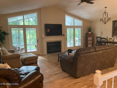 This lovely lakefront home located in a quiet cove, is nestled on Toqua Golf Course - Loudon County in Tennessee - for sale on GolfHomes.com, golf home, golf lot