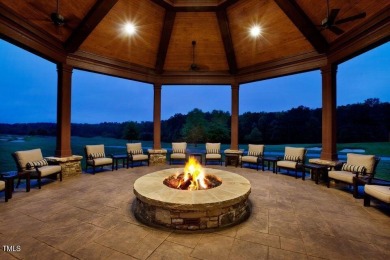 Welcome to your Dream Home perfectly tucked away behind the 8th on Hasentree Club in North Carolina - for sale on GolfHomes.com, golf home, golf lot