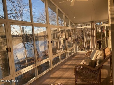 This lovely lakefront home located in a quiet cove, is nestled on Toqua Golf Course - Loudon County in Tennessee - for sale on GolfHomes.com, golf home, golf lot