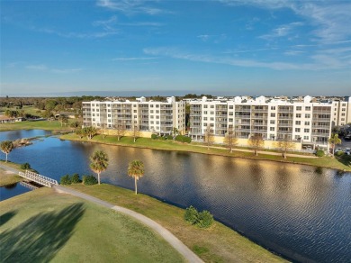 2 BEDROOM / 2 BATH LAKEFRONT CONDO WITH SPECTACULAR WEST FACING on East Bay Golf Club in Florida - for sale on GolfHomes.com, golf home, golf lot