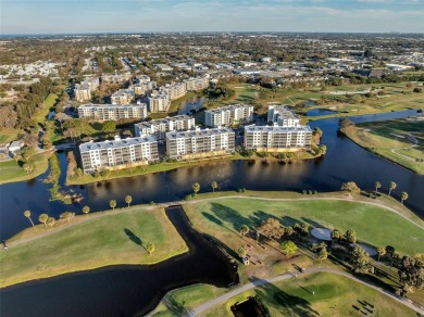 2 BEDROOM / 2 BATH LAKEFRONT CONDO WITH SPECTACULAR WEST FACING on East Bay Golf Club in Florida - for sale on GolfHomes.com, golf home, golf lot