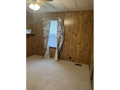 3 Bedroom 2 Bath Mobile Home with updated furnaces And Hot Water on Cottonwood Country Club in Montana - for sale on GolfHomes.com, golf home, golf lot