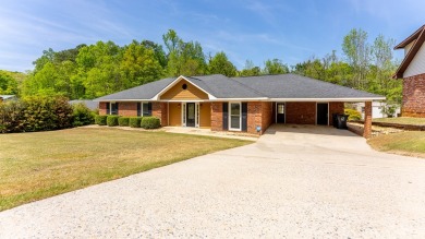 This stunning 3 Bed, 2 bath all-brick ranch nestled in Silver on Lakewood Golf Course in Alabama - for sale on GolfHomes.com, golf home, golf lot