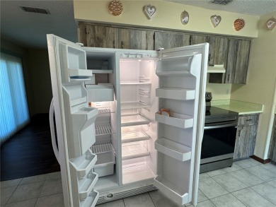 Move-in ready home in a 55+ community, ideal as a winter retreat on On Top of the World Golf Course in Florida - for sale on GolfHomes.com, golf home, golf lot