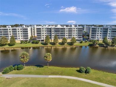 2 BEDROOM / 2 BATH LAKEFRONT CONDO WITH SPECTACULAR WEST FACING on East Bay Golf Club in Florida - for sale on GolfHomes.com, golf home, golf lot