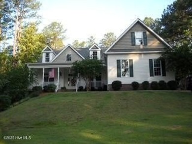Gorgeous 3 bedroom, 3 bath home nestled  in a desirable golfing on Whispering Pines Golf Course in North Carolina - for sale on GolfHomes.com, golf home, golf lot