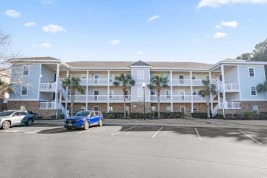Modern and fully furnished 2 bed, 2 bath top-floor unit in on Barefoot Resort and Golf Club  in South Carolina - for sale on GolfHomes.com, golf home, golf lot