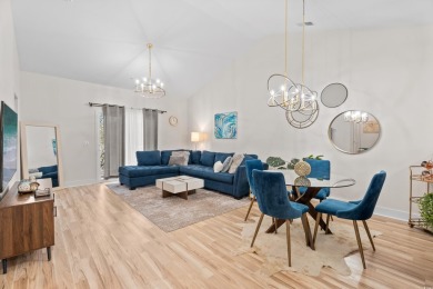 Modern and fully furnished 2 bed, 2 bath top-floor unit in on Barefoot Resort and Golf Club  in South Carolina - for sale on GolfHomes.com, golf home, golf lot
