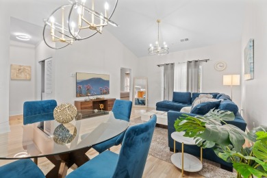 Modern and fully furnished 2 bed, 2 bath top-floor unit in on Barefoot Resort and Golf Club  in South Carolina - for sale on GolfHomes.com, golf home, golf lot