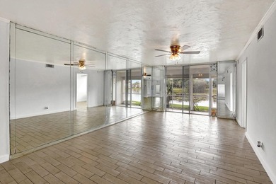 Largest One Bedroom On PGA Golf Course With Lake Views In on Hollybrook Golf and Tennis Club  in Florida - for sale on GolfHomes.com, golf home, golf lot