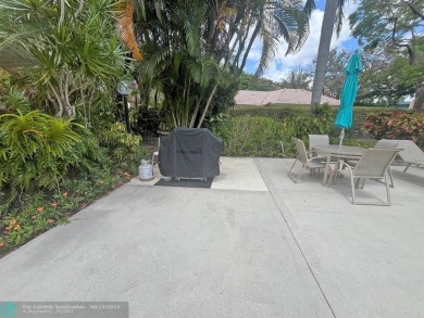 NESTLED IN ONE OF PALM AIRE COUNTRY CLUB'S MOST DESIRABLE on Palm-Aire Country Club and Resort - The Oaks in Florida - for sale on GolfHomes.com, golf home, golf lot