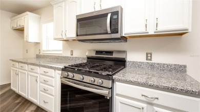 SELLER IS MOVTIVATED!  Welcome to this 3 BEDROOM, 2 BATHROOM on Arlington Ridge Golf Club in Florida - for sale on GolfHomes.com, golf home, golf lot