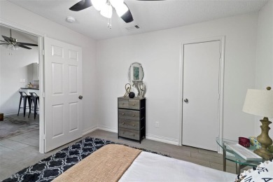 Discover the allure of this stylish one-bedroom condo with an on Royal Oaks Country Club in Texas - for sale on GolfHomes.com, golf home, golf lot