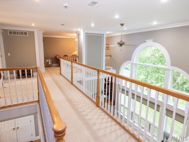 Stunning two-story brick home nestled on 6.3 acres in Hannibal on Hannibal Country Club in Missouri - for sale on GolfHomes.com, golf home, golf lot