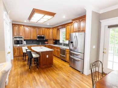 Stunning two-story brick home nestled on 6.3 acres in Hannibal on Hannibal Country Club in Missouri - for sale on GolfHomes.com, golf home, golf lot