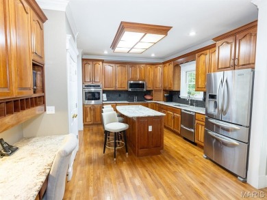 Stunning two-story brick home nestled on 6.3 acres in Hannibal on Hannibal Country Club in Missouri - for sale on GolfHomes.com, golf home, golf lot