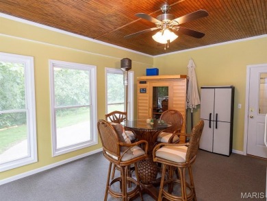 Stunning two-story brick home nestled on 6.3 acres in Hannibal on Hannibal Country Club in Missouri - for sale on GolfHomes.com, golf home, golf lot