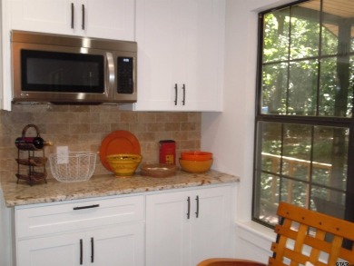 Elegance meets country charm in this completely remodeled home on Holly Lake Ranch Golf Club in Texas - for sale on GolfHomes.com, golf home, golf lot