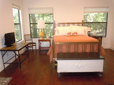 Elegance meets country charm in this completely remodeled home on Holly Lake Ranch Golf Club in Texas - for sale on GolfHomes.com, golf home, golf lot