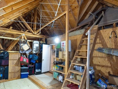 Stunning two-story brick home nestled on 3 acres in Hannibal on Hannibal Country Club in Missouri - for sale on GolfHomes.com, golf home, golf lot