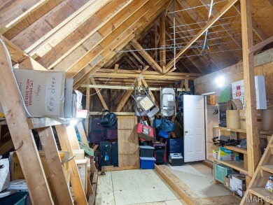 Stunning two-story brick home nestled on 3 acres in Hannibal on Hannibal Country Club in Missouri - for sale on GolfHomes.com, golf home, golf lot