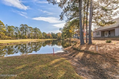 Outstanding Price Improvement! PICTURESQUE VIEWS OF GOLF COURSE on Harbour Point Golf Club in North Carolina - for sale on GolfHomes.com, golf home, golf lot