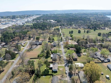 The smell of fresh-cut grass and spring flowers welcomes you to on  in Arkansas - for sale on GolfHomes.com, golf home, golf lot