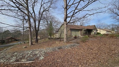 Welcome to market this beautifully updated 3 bedroom, 2 bath on Indian Hills Country Club in Arkansas - for sale on GolfHomes.com, golf home, golf lot