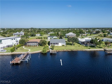 This waterfront home places the Peace River right in your on Deep Creek Golf Club in Florida - for sale on GolfHomes.com, golf home, golf lot