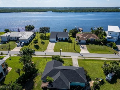 This waterfront home places the Peace River right in your on Deep Creek Golf Club in Florida - for sale on GolfHomes.com, golf home, golf lot