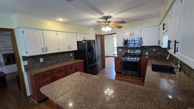 Welcome to market this beautifully updated 3 bedroom, 2 bath on Indian Hills Country Club in Arkansas - for sale on GolfHomes.com, golf home, golf lot