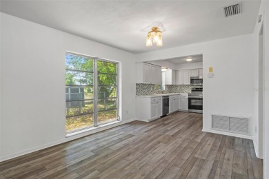 Under contract-accepting backup offers. Welcome to your dream on Oak Hills Country Club in Florida - for sale on GolfHomes.com, golf home, golf lot