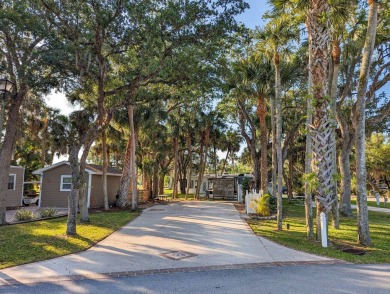 Located in an exclusive gated community with a championship on The Great Outdoors Golf and Country Club in Florida - for sale on GolfHomes.com, golf home, golf lot