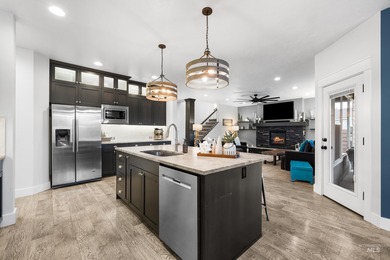 Welcome to this beautifully appointed home offering 5 bedrooms on SpurWing Country Club in Idaho - for sale on GolfHomes.com, golf home, golf lot