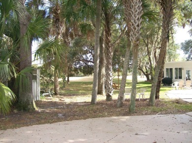 Located in an exclusive gated community with a championship on The Great Outdoors Golf and Country Club in Florida - for sale on GolfHomes.com, golf home, golf lot