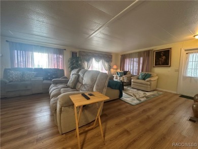Welcome to this beautifully maintained 2-bedroom, 2-bathroom on Heather Golf and Country Club in Florida - for sale on GolfHomes.com, golf home, golf lot
