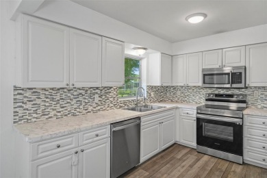 Under contract-accepting backup offers. Welcome to your dream on Oak Hills Country Club in Florida - for sale on GolfHomes.com, golf home, golf lot