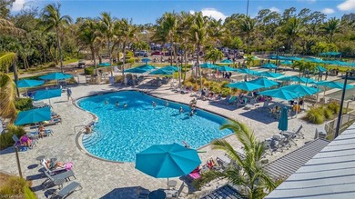 Enjoy peaceful Southwest Florida living in this first-floor on Pelican Sound Golf and River Club in Florida - for sale on GolfHomes.com, golf home, golf lot
