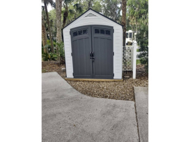 Located in an exclusive gated community with a championship on The Great Outdoors Golf and Country Club in Florida - for sale on GolfHomes.com, golf home, golf lot