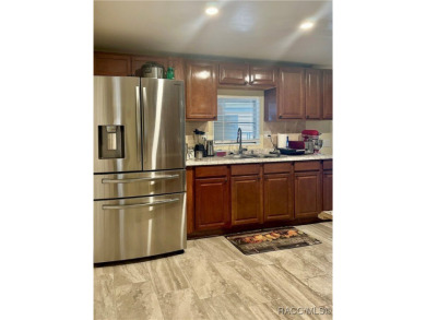 Welcome to this beautifully maintained 2-bedroom, 2-bathroom on Heather Golf and Country Club in Florida - for sale on GolfHomes.com, golf home, golf lot