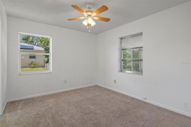 Under contract-accepting backup offers. Welcome to your dream on Oak Hills Country Club in Florida - for sale on GolfHomes.com, golf home, golf lot