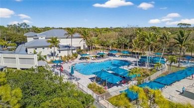 Enjoy peaceful Southwest Florida living in this first-floor on Pelican Sound Golf and River Club in Florida - for sale on GolfHomes.com, golf home, golf lot