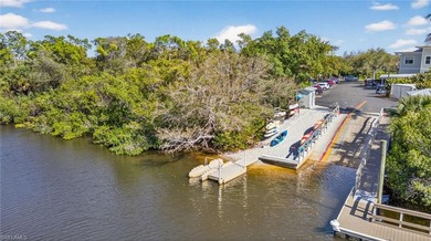 Enjoy peaceful Southwest Florida living in this first-floor on Pelican Sound Golf and River Club in Florida - for sale on GolfHomes.com, golf home, golf lot